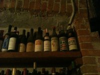 Bottles_on_Shelf_at_Giuseppe_Rinaldi.jpg